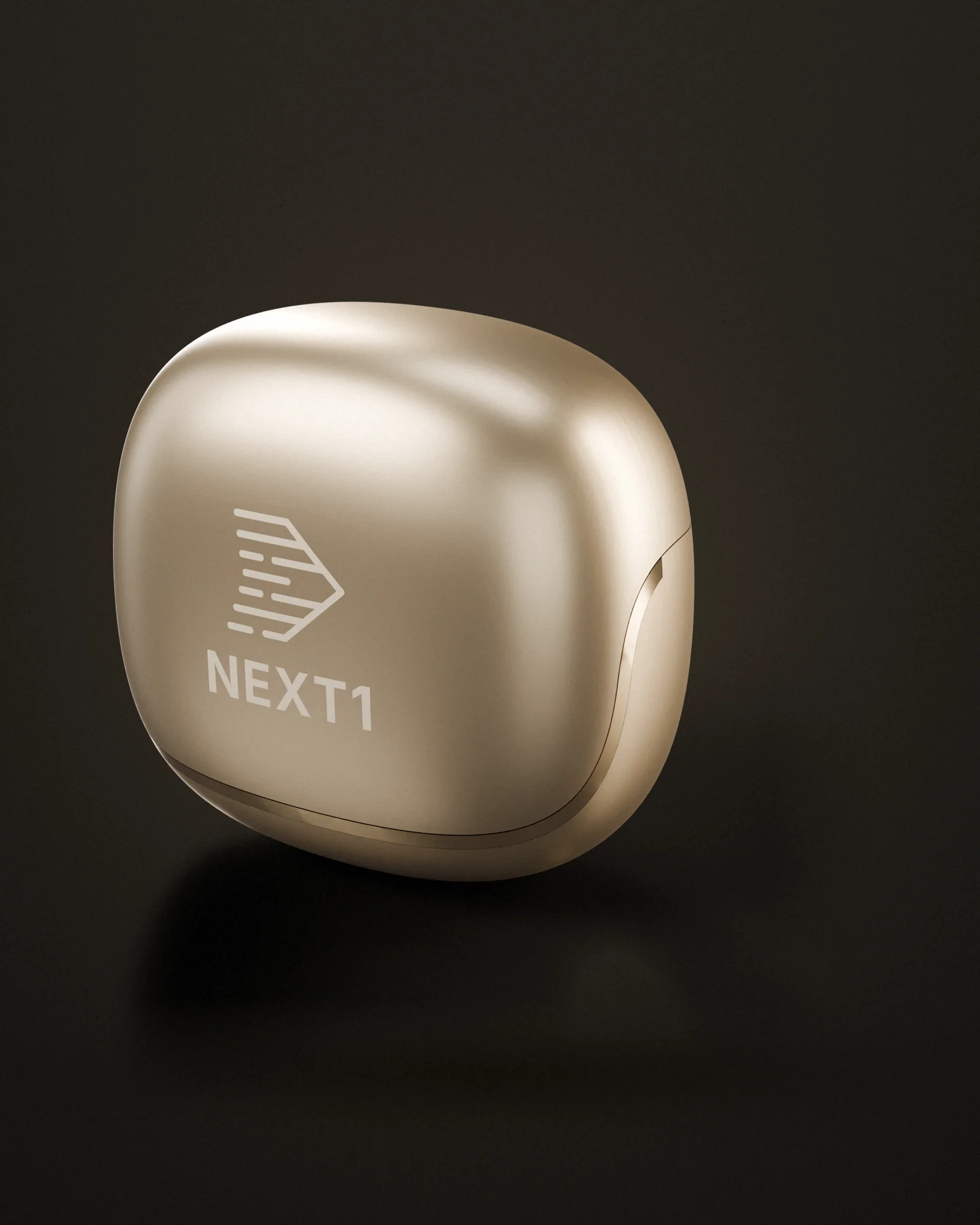 The closed gold NEXT1 charging case on a dark surface